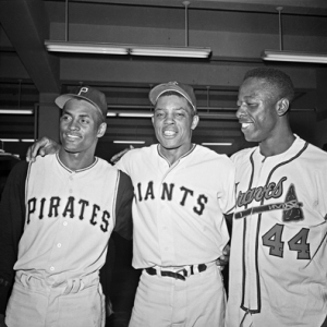 1961 National League All-Stars Roberto Clemente, Willie Mays and Hank Aaron pose for a post-game photo.