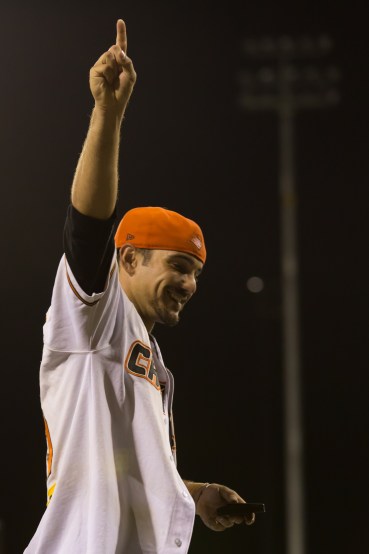 Kody Hightower celebrates the Canberra Cavalry receiving the Claxton Shield after winning the 2013 ABL Championship Series. (Ben Southall/SMP Images)