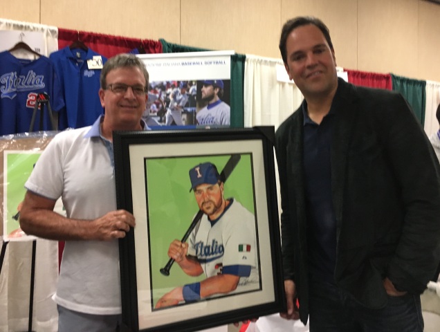 Italian American Baseball Family's Joe Quagliano and Mike Piazza hold James Fiorentino's portrait of the Hall of Famer.